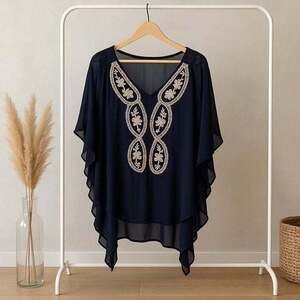 Black cover up with white embroidery details